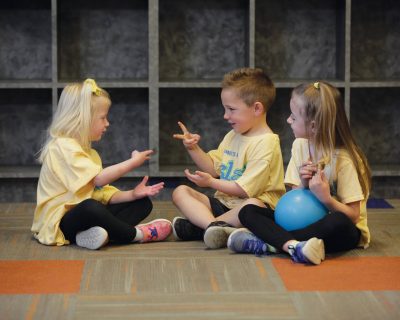 Kids Playing Rock Paper Scissors at Colorado Athletic Club - Monaco's Summer Camp