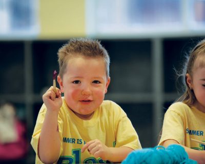 Child Painting at Colorado Athletic Club - Monaco's Blast! Summer Camp