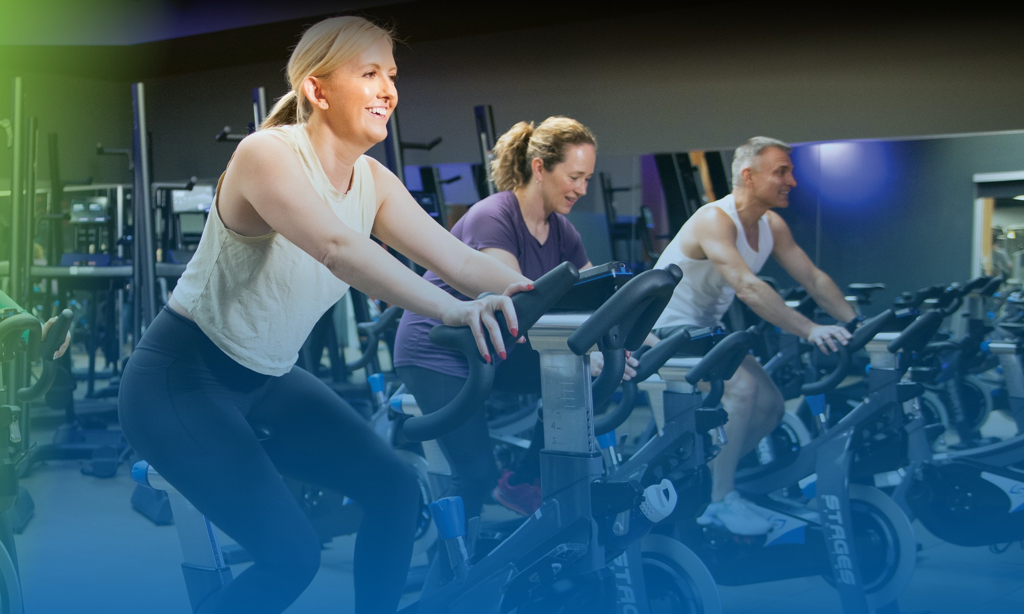 Three people using treadmills at the Colorado Athletic Club