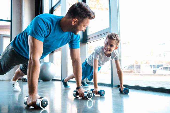 guy and son doing pushups