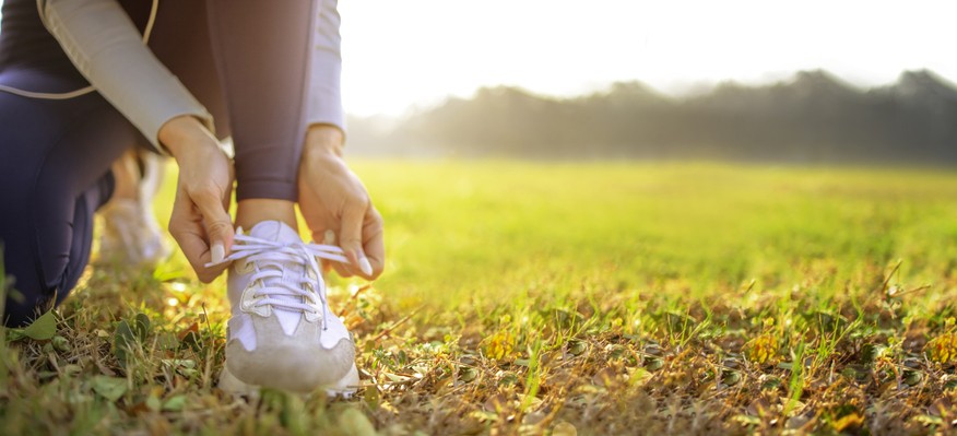 Women adjusting her lace in ground, CO