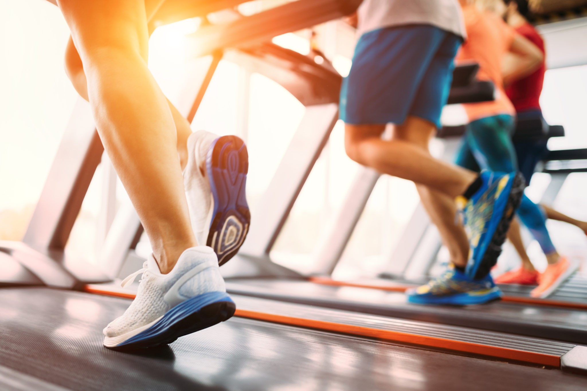 People doing cardio in treadmill, Co
