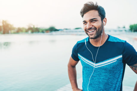 Man listening to a workout playlist