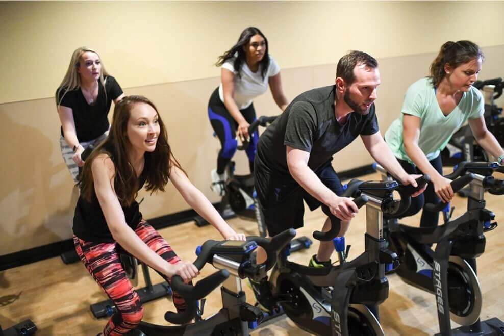 A group at cycling class at Colorado Athletic Club DTC in Denver.