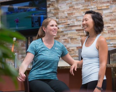 Friends Talking at a Colorado Athletic Club - Monaco Networking Event