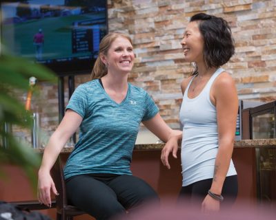 Friends Talking at a Networking Event | Colorado Athletic Club - DTC | Athletic Club and Gym
