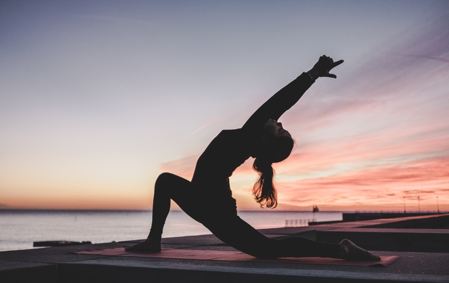A girl is doing Yoga.