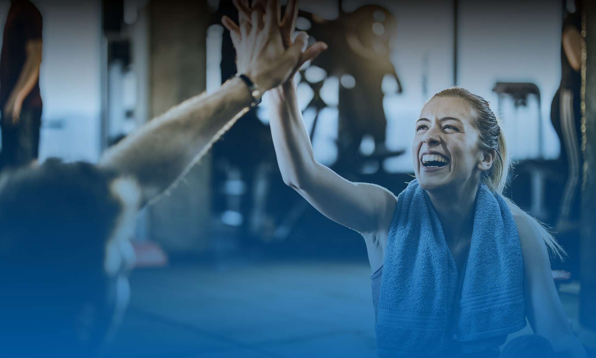 A woman and man engage in a workout, promoting look forward to your return policy in South Denver