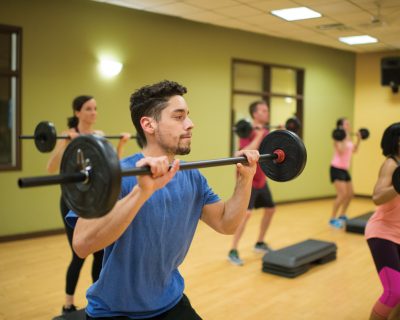 Group Fitness Class Lifting Weights | Colorado Athletic Club - DTC