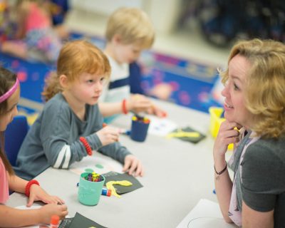 Girls Making Crafts at Colorado Athletic Club - Monaco's Free Daycare