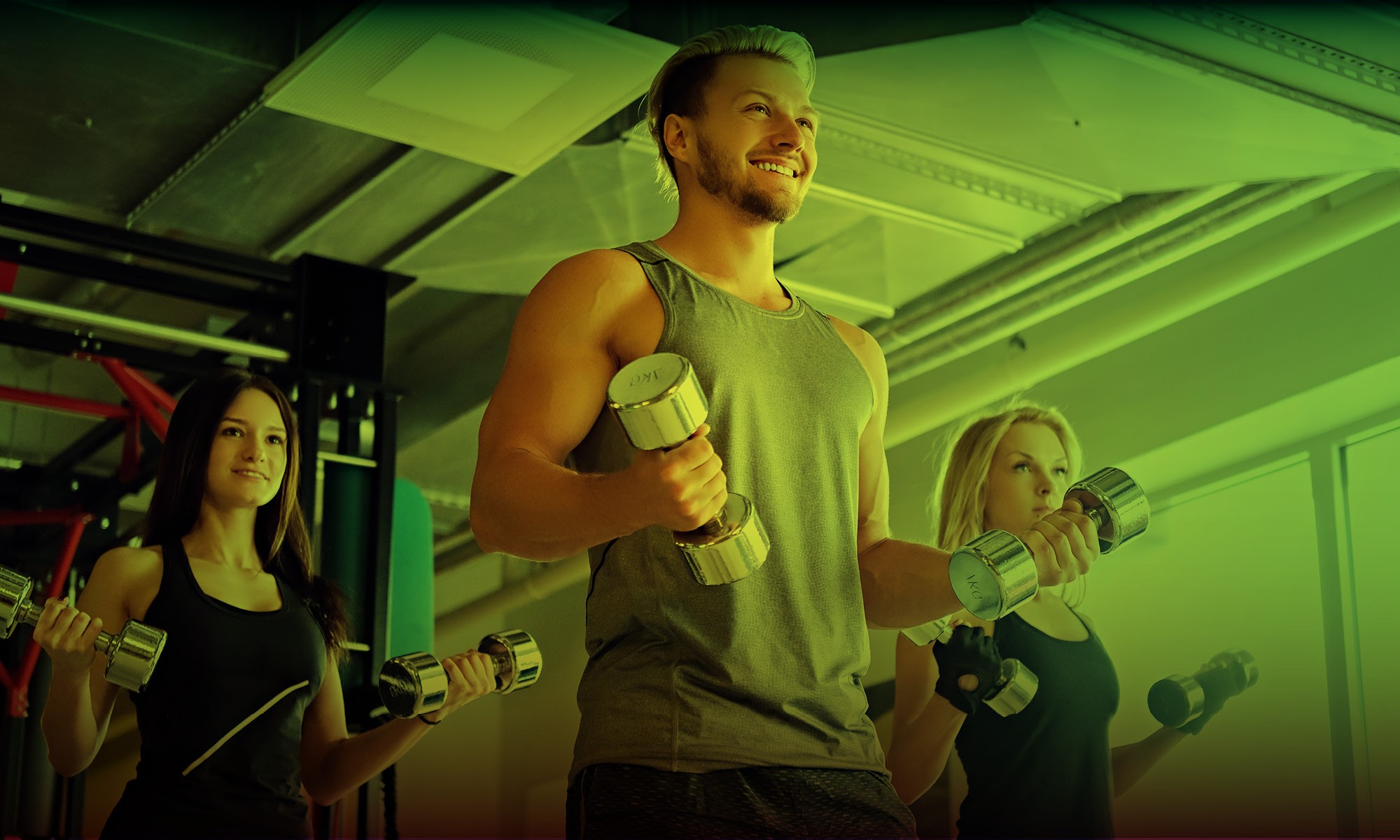 Young adults working out at Wellbridge Athletic Clubs