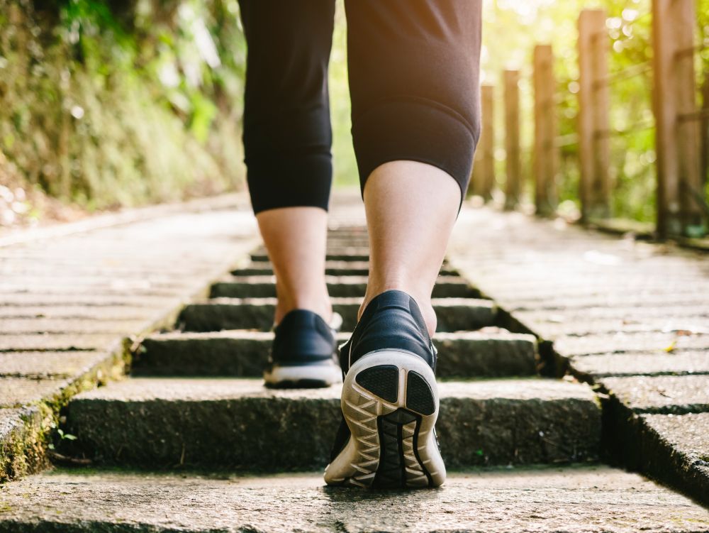Woman walk step exercise outdoor sport shoe Trail Track at Greenwood Village, CO