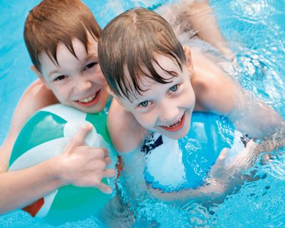 Two Boys Playing in the Swimming Pool | Colorado Athletic Club - Flatirons