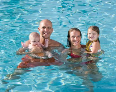 Family With Kids Enjoying the Pools at Colorado Athletic Club - Monaco | Family Friendly Gym