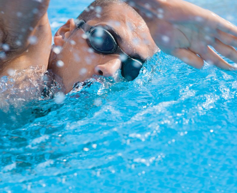 Man swiming in South Denver pool