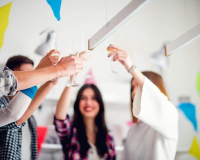 Group Toasting at a Club Happy Hour | Colorado Athletic Club - DTC | Athletic Club and Gym