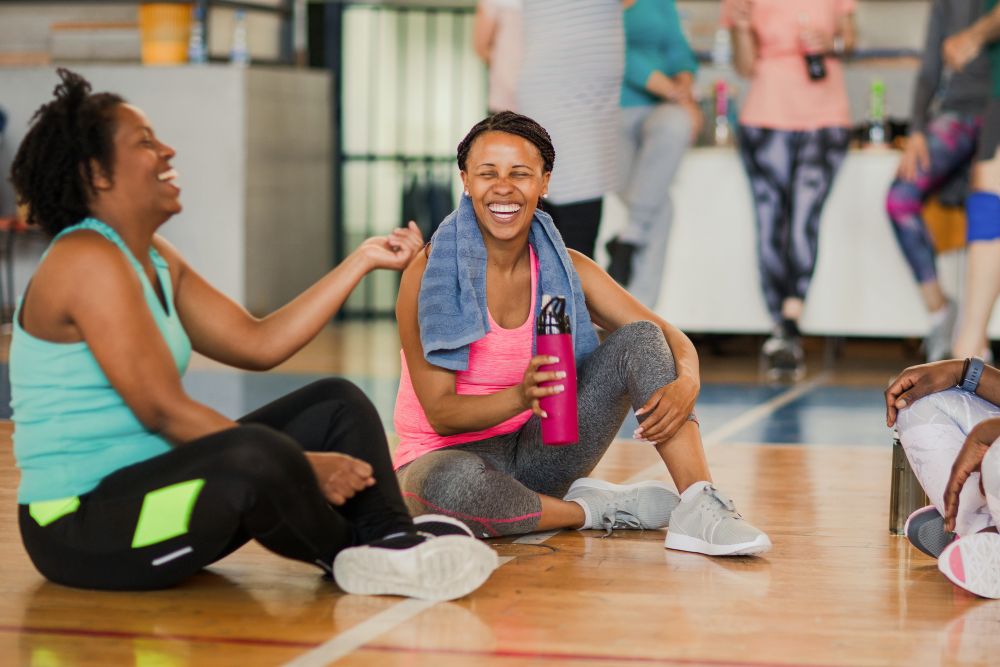 Woman Enjoying Her First Fitness Class at Greenwood Village, CO