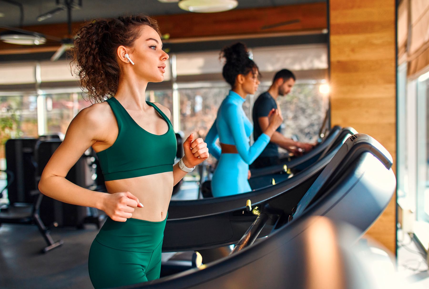 Woman Running At The Health Club